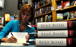 Lori Roy signing books